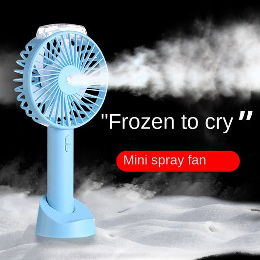 Handheld charging spray hydrating fan hot sale student usb new humidifier fan portable mini fan