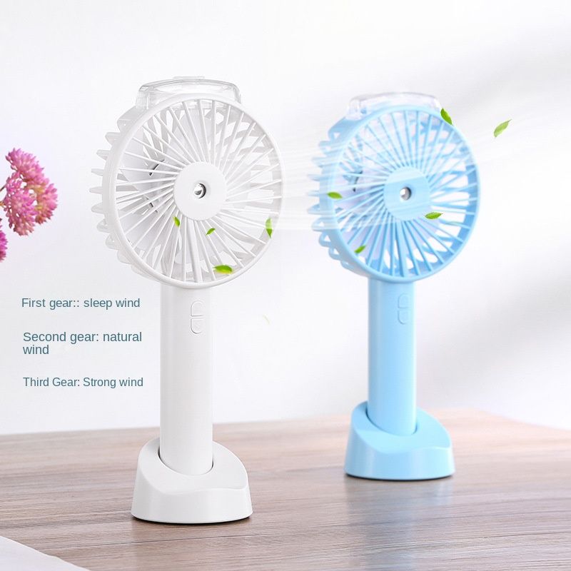 Handheld charging spray hydrating fan hot sale student usb new humidifier fan portable mini fan