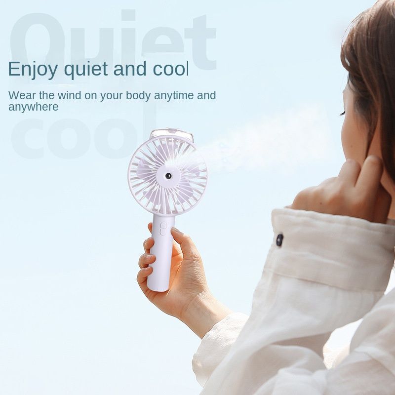 Handheld charging spray hydrating fan hot sale student usb new humidifier fan portable mini fan